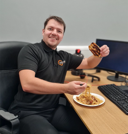 EntrySign team member smiling with lunch