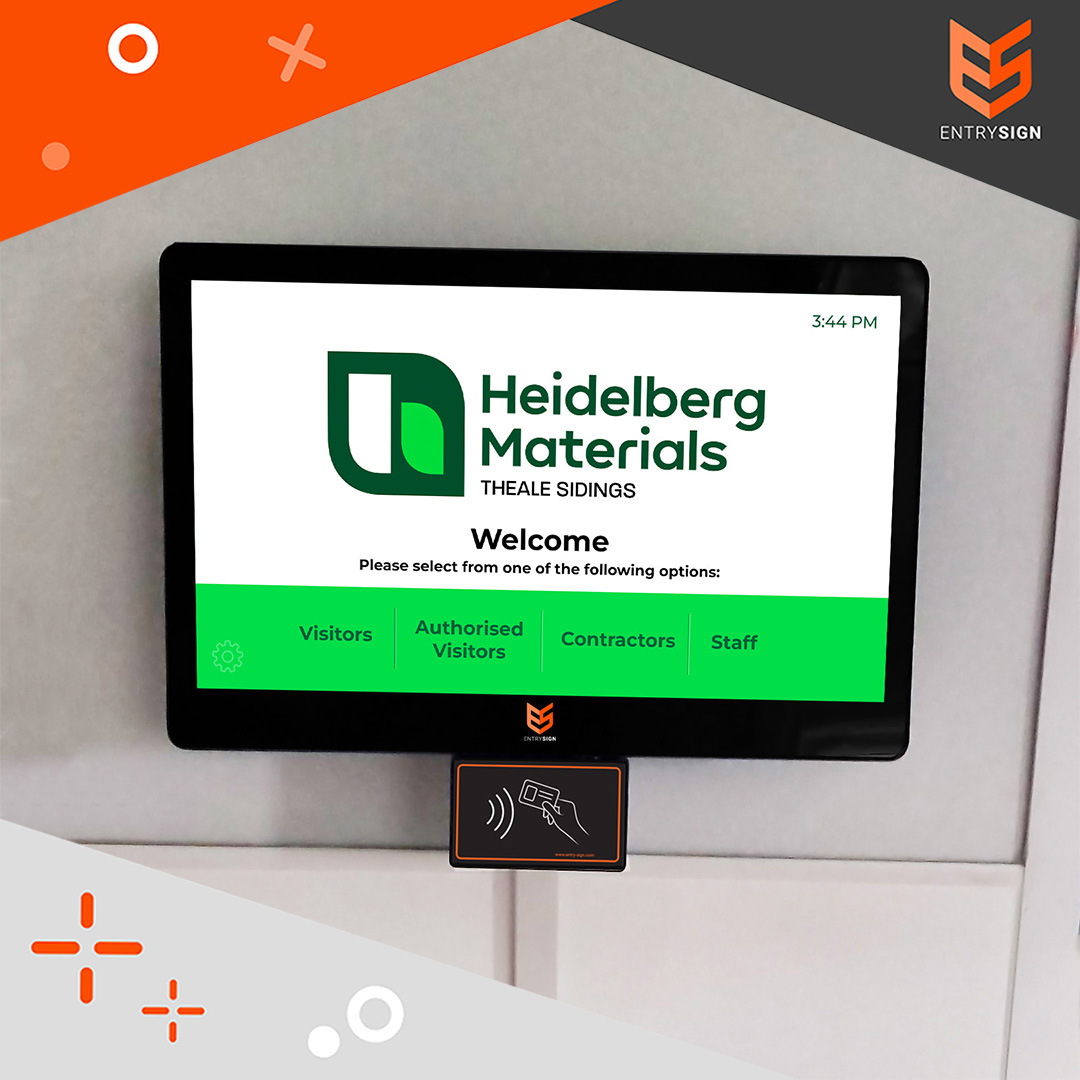 Visitor management screen fitted to a grey wall with green and white interface